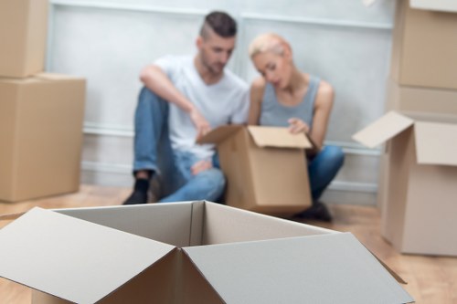 Packed moving boxes ready for a home relocation in Enfieldwash