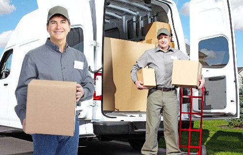 Packed office furniture ready for a local relocation