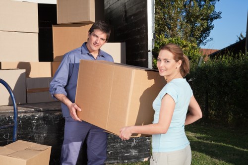 Professional man and van loading boxes for a move in Enfieldwash